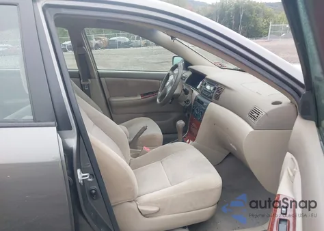 2005 Toyota Corolla Le z USA, uszkodzony, nr VIN 2T1BR30E85C360254